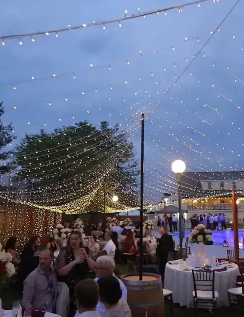 Overhead strings of lights wedding