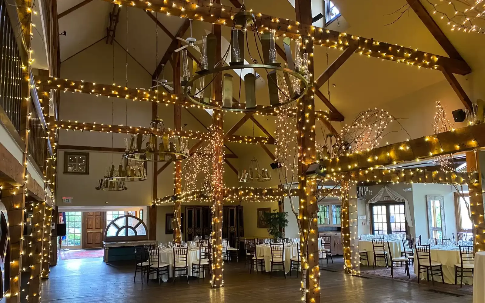 Wooden beams wrapped with lights