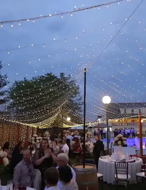 Overhead strings of lights wedding