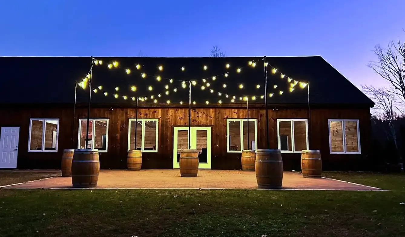 Outdoor dance floor with lights overhead